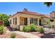 Attractive home featuring desert landscaping, a red tile roof, a covered patio, and ample sunlight at 2832 Cape Hope Way, Las Vegas, NV 89121