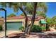 Inviting single-story house with a two-car garage, desert landscaping, and a red tile roof at 2832 Cape Hope Way, Las Vegas, NV 89121