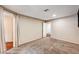 Open office featuring carpeted floors and archway to a hallway at 2832 Cape Hope Way, Las Vegas, NV 89121