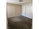 Standard bedroom with wall-to-wall carpeting and a sliding door closet at 2974 Juniper Hills Blvd # 104, Las Vegas, NV 89142