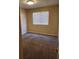 Bedroom with a window for natural light, neutral walls, and tan carpet at 2974 Juniper Hills Blvd # 104, Las Vegas, NV 89142