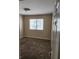 Standard bedroom with wall-to-wall carpeting and a window at 2974 Juniper Hills Blvd # 104, Las Vegas, NV 89142