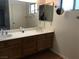 Bathroom featuring a double sink vanity with new mirrors at 3138 White Rose Way, Henderson, NV 89014