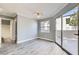 Bright bedroom with sliding glass doors leading to the patio at 3150 Soft Breezes Dr # 1050, Las Vegas, NV 89128