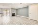 Bright living room featuring a stone fireplace and sliding glass doors to the patio at 3150 Soft Breezes Dr # 1050, Las Vegas, NV 89128