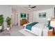 Beautiful bedroom featuring bright white walls, stylish decor, and a ceiling fan for added comfort at 326 Fuente Dr, Henderson, NV 89014
