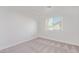 Bedroom with neutral paint, patterned carpet, and base trim at 326 Fuente Dr, Henderson, NV 89014