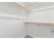 Walk-in closet features built-in shelving and ample storage space at 326 Fuente Dr, Henderson, NV 89014