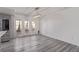 Dining area with wood floors, modern lighting, and access to the outdoor area at 326 Fuente Dr, Henderson, NV 89014