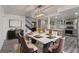 Bright dining area connected to kitchen with stairs and stylish decor at 326 Fuente Dr, Henderson, NV 89014