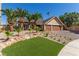 Charming single-story home with manicured lawn and beautiful landscaping at 326 Fuente Dr, Henderson, NV 89014