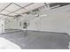 Spacious three car garage with mirror, water heater and automatic doors at 326 Fuente Dr, Henderson, NV 89014