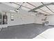 Spacious three car garage with mirror, water heater and automatic doors at 326 Fuente Dr, Henderson, NV 89014
