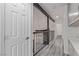 Hallway features wood-look floors, beam, and white cabinets at 326 Fuente Dr, Henderson, NV 89014