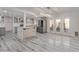 Open kitchen area with island, stainless steel appliances, and access to the backyard at 326 Fuente Dr, Henderson, NV 89014