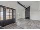 Spacious living room with a floor-to-ceiling fireplace and laminate flooring at 326 Fuente Dr, Henderson, NV 89014
