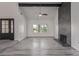 Open living room showcases high ceilings, fireplace, wood floors, and bright windows at 326 Fuente Dr, Henderson, NV 89014