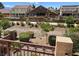 Backyard landscape featuring neighborhood homes, mature trees, and shrubbery from an elevated view at 3624 Pelican Brief Ln, North Las Vegas, NV 89084