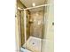Bathroom featuring a walk-in shower with a stone-like tile wall at 3624 Pelican Brief Ln, North Las Vegas, NV 89084