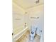 Bathroom features a clean white bathtub with a shower, and a toilet at 3624 Pelican Brief Ln, North Las Vegas, NV 89084