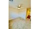 Carpeted bedroom featuring a ceiling fan and closet at 3624 Pelican Brief Ln, North Las Vegas, NV 89084
