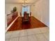 Formal dining room with hardwood floors, chandelier, and elegant dining set at 3624 Pelican Brief Ln, North Las Vegas, NV 89084