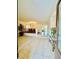 Inviting entryway with tiled floors, a view of the living spaces, and a flower arrangement at 3624 Pelican Brief Ln, North Las Vegas, NV 89084