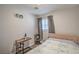 Bedroom featuring a desk, small bed, and natural light from window at 4078 Gold Coast Dr, Las Vegas, NV 89121