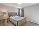 Comfortable bedroom with wood furniture, carpet, and natural light at 4078 Gold Coast Dr, Las Vegas, NV 89121