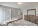 Bedroom featuring furniture set, view of bathroom, and adjacent rooms at 4078 Gold Coast Dr, Las Vegas, NV 89121