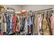 Organized closet with ample storage and clothing racks at 4078 Gold Coast Dr, Las Vegas, NV 89121