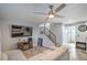 Image of the living room leading to stairs and kitchen at 4078 Gold Coast Dr, Las Vegas, NV 89121