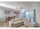Image showing a living room with sliding glass door to patio at 4078 Gold Coast Dr, Las Vegas, NV 89121