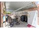 Cozy backyard with outdoor dining and a refrigerator, all under a covered patio at 4115 Ridgewood Ave, Las Vegas, NV 89120