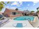 Charming backyard with a pool, patio, and a relaxing hammock at 4115 Ridgewood Ave, Las Vegas, NV 89120