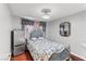 Cozy bedroom with stylish bed, mirrored accents, and modern lighting at 4115 Ridgewood Ave, Las Vegas, NV 89120
