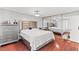 Bright bedroom with wood floors, mirrored closet, and stylish furnishings at 4115 Ridgewood Ave, Las Vegas, NV 89120