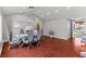 Contemporary dining area featuring a modern table set and beautiful flooring at 4115 Ridgewood Ave, Las Vegas, NV 89120