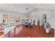 Bright dining room showcasing a modern table set, lovely flooring, and backyard view at 4115 Ridgewood Ave, Las Vegas, NV 89120