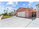 Spacious driveway leading to a two-car garage, offering ample parking at 4115 Ridgewood Ave, Las Vegas, NV 89120