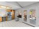 Bright kitchen featuring stainless steel appliances, lots of cabinet space and access to the backyard at 4115 Ridgewood Ave, Las Vegas, NV 89120