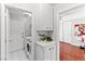 Laundry room with washer, dryer, storage, and access to other areas at 4115 Ridgewood Ave, Las Vegas, NV 89120