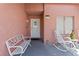 Inviting front porch with seating area, perfect for enjoying the outdoors at 4115 Ridgewood Ave, Las Vegas, NV 89120