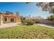 Spacious backyard with lawn, ideal for outdoor entertaining and relaxation at 4336 Fenton Ln, North Las Vegas, NV 89032