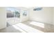 Bedroom with sliding glass doors leading to the backyard and carpet flooring at 4336 Fenton Ln, North Las Vegas, NV 89032