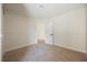 Well-lit bedroom with neutral carpet, paint, and trim create a comfortable and relaxing atmosphere at 4336 Fenton Ln, North Las Vegas, NV 89032
