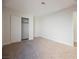 Spacious bedroom featuring neutral carpet and closet with sliding doors, creating a cozy retreat at 4336 Fenton Ln, North Las Vegas, NV 89032