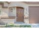 Inviting front entrance with a stylish door, manicured landscaping, and prominent house numbers at 4336 Fenton Ln, North Las Vegas, NV 89032