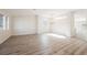 Bright, airy living room features beautiful wood floors, fresh paint, and lots of natural light at 4336 Fenton Ln, North Las Vegas, NV 89032