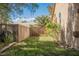 Side yard with low-maintenance landscaping, block wall fencing, and gate for added privacy at 4336 Fenton Ln, North Las Vegas, NV 89032